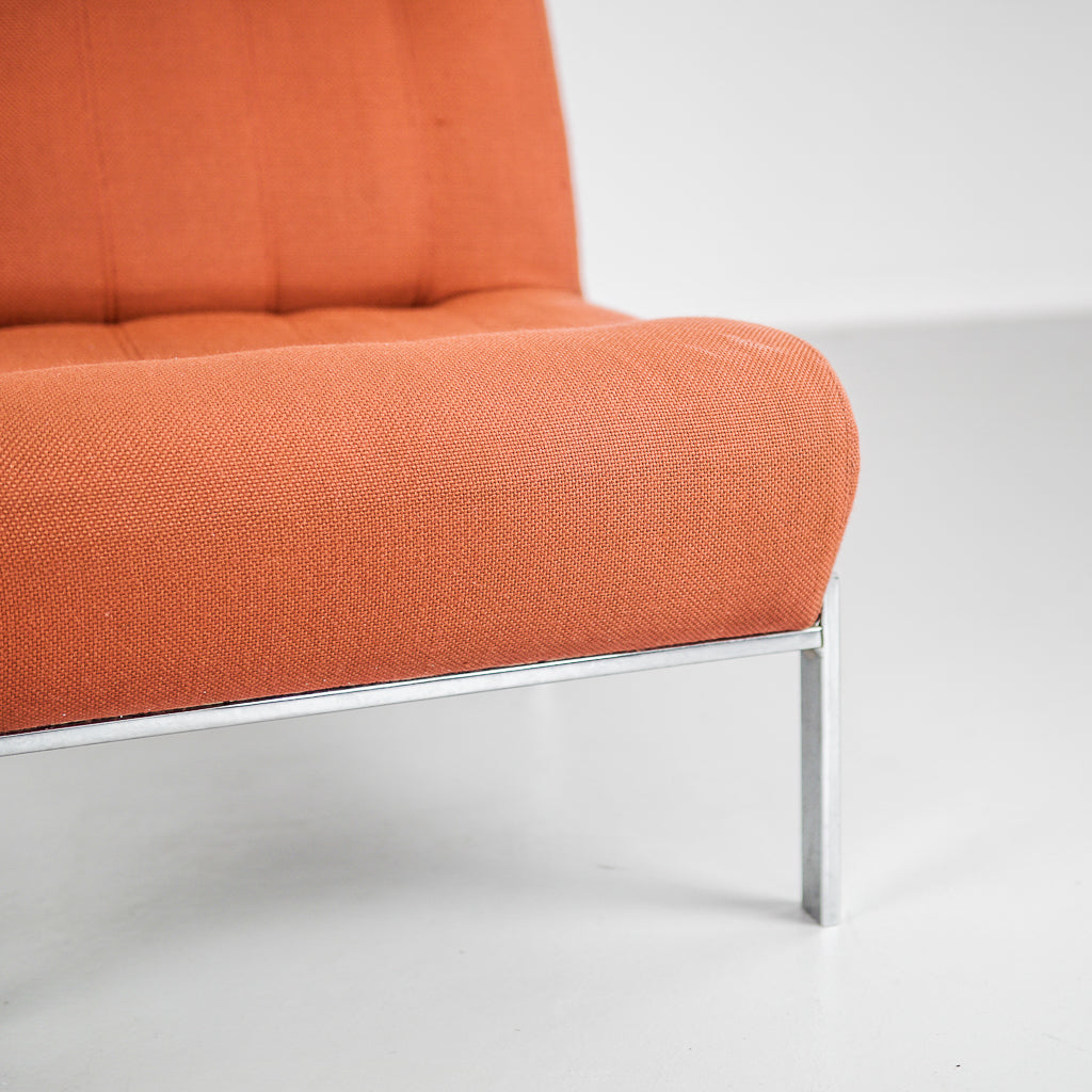 One seat orange and steel frame Sofa